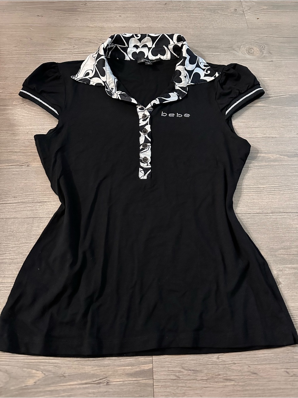 bebe Black Polo Top with Monochrome Patterned Collar
